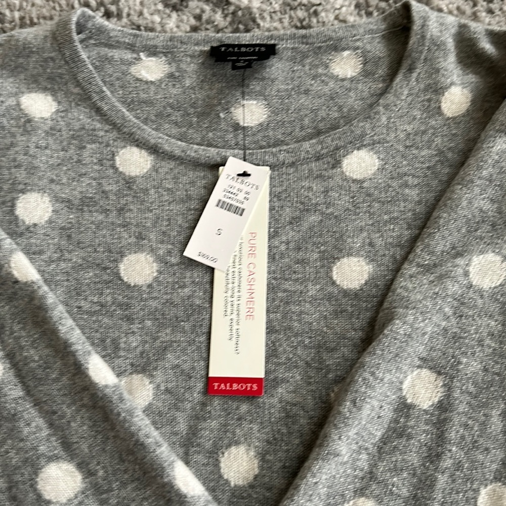 Gray and white polka dotted crew neck sweater